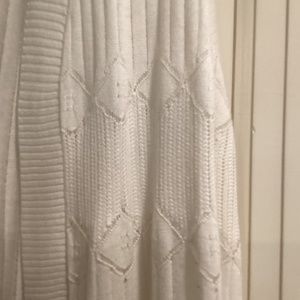 Long white crocheted vest